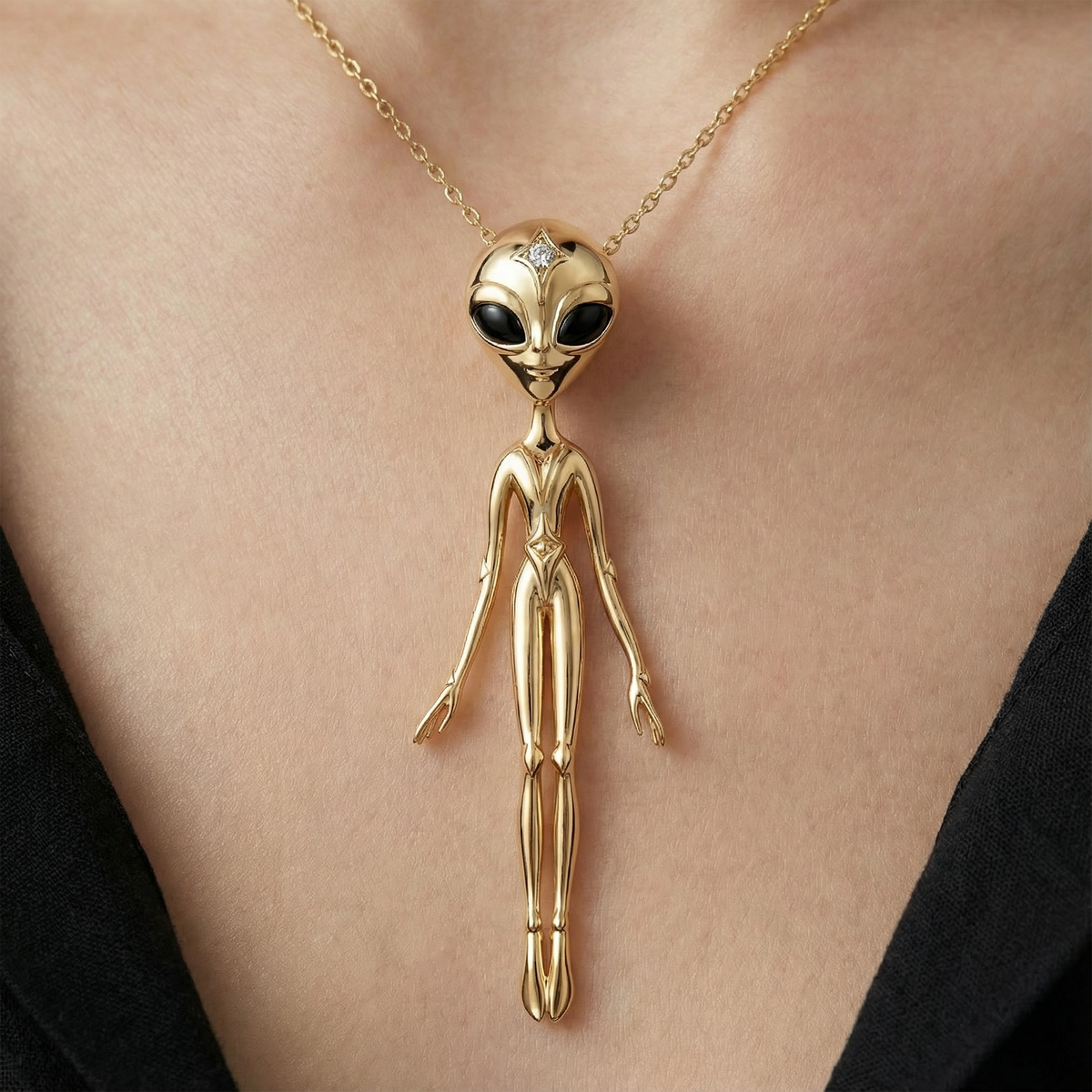 18k gold alien pendant necklace with diamond worn on neck, statement luxury fine jewellery design