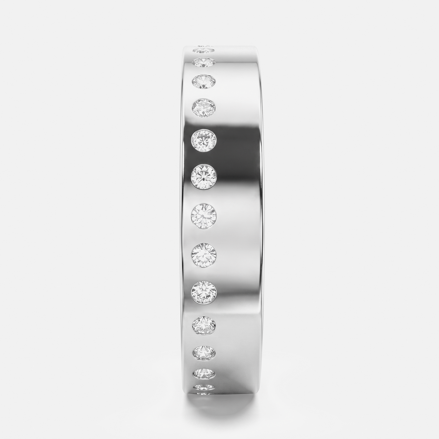 A polished silver-toned band ring featuring a vertical row of round clear gemstones, shown on a clean light gray background.
