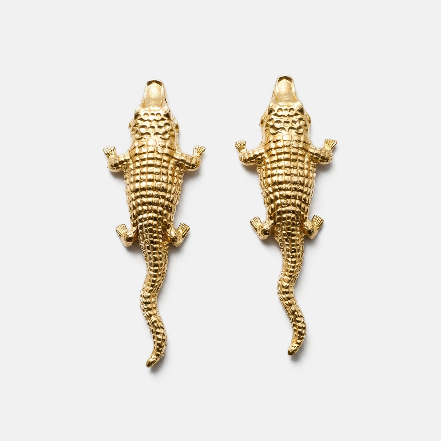 Crocodile-inspired gold statement earrings