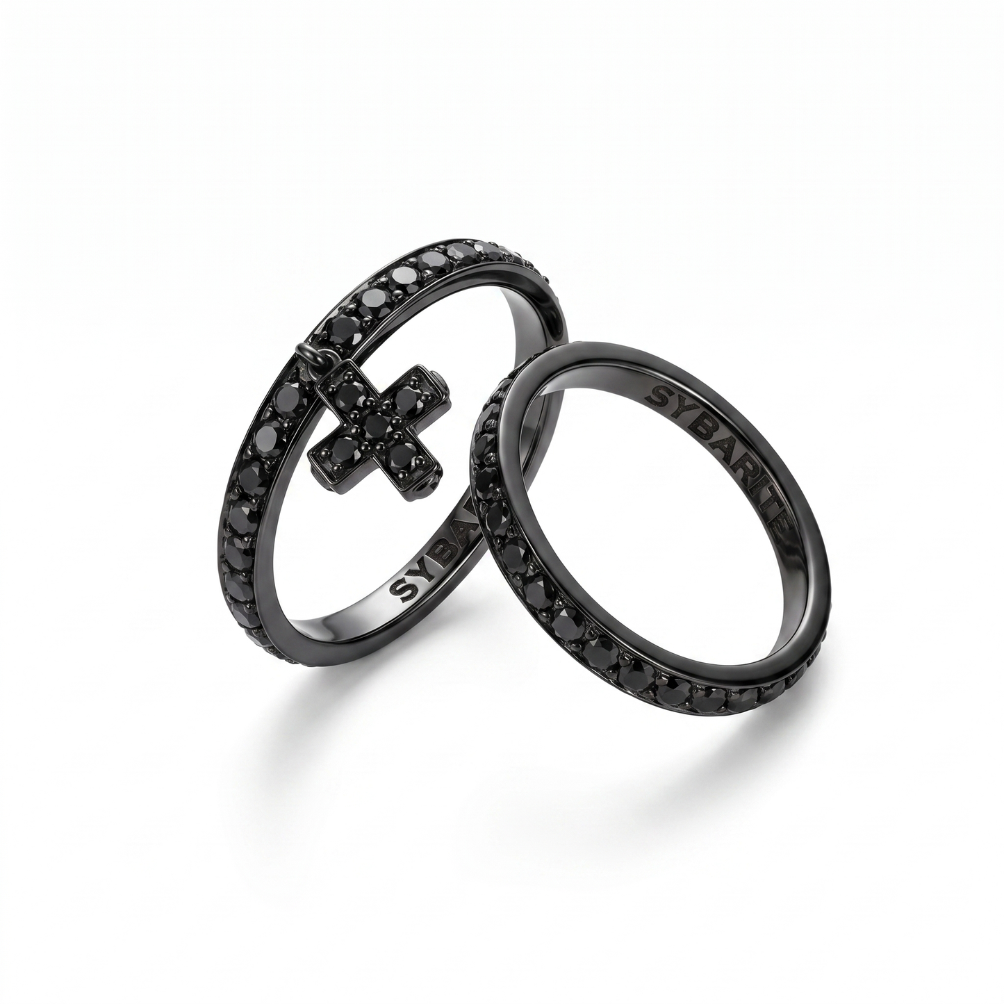 Stackable black diamond rings in blackened 18k gold, Sybarite designer jewellery set with cross pendant ring, contemporary fine jewellery