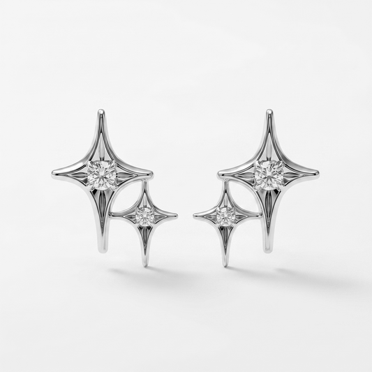 Diamond star earrings in white gold, elegant fine jewellery studs with modern celestial design