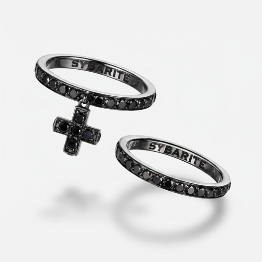 Blackened 18k gold rings set with black diamonds by Sybarite Jewellery, luxury designer stackable rings with cross charm, modern gothic fine jewellery