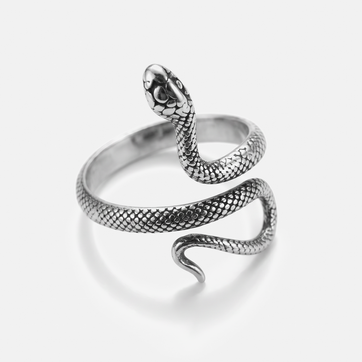 A silver snake wrap ring with detailed scales and a polished head, shown on a clean light gray background.