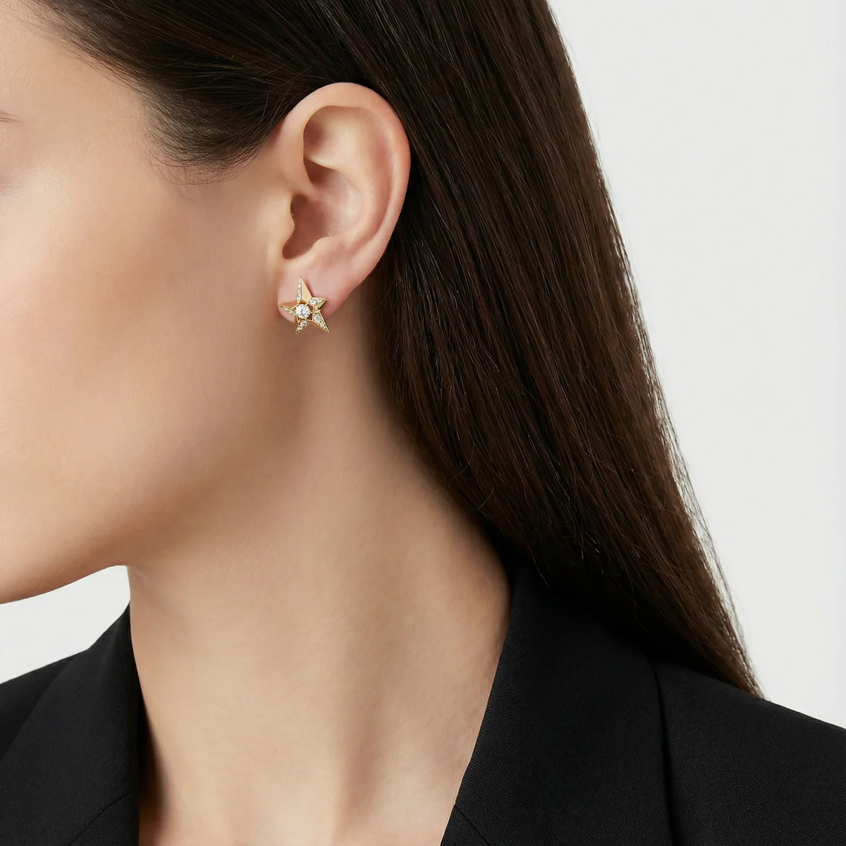 18k gold star earrings with diamonds worn on ear, elegant everyday fine jewellery look