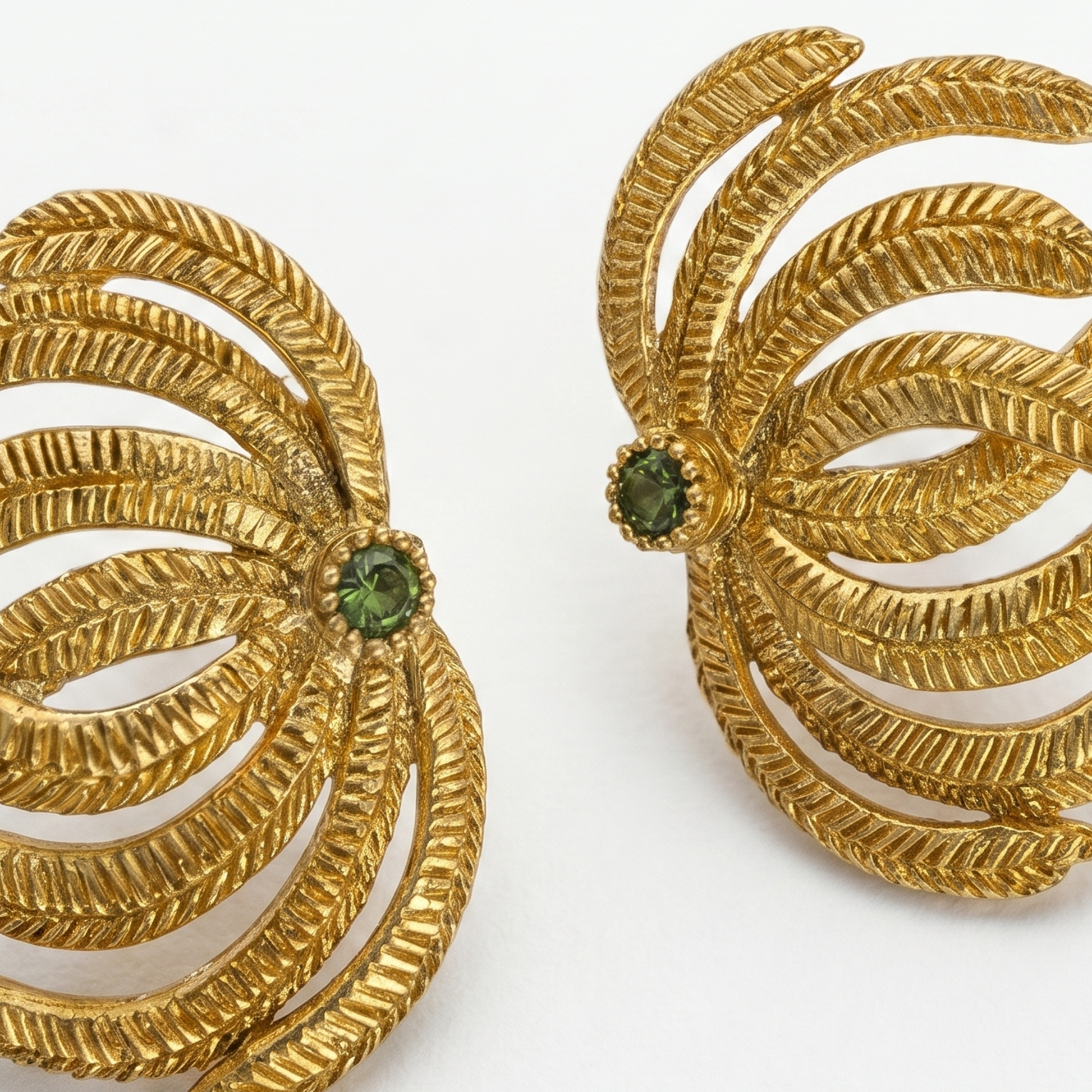 Botanical inspired gold statement earrings close ups