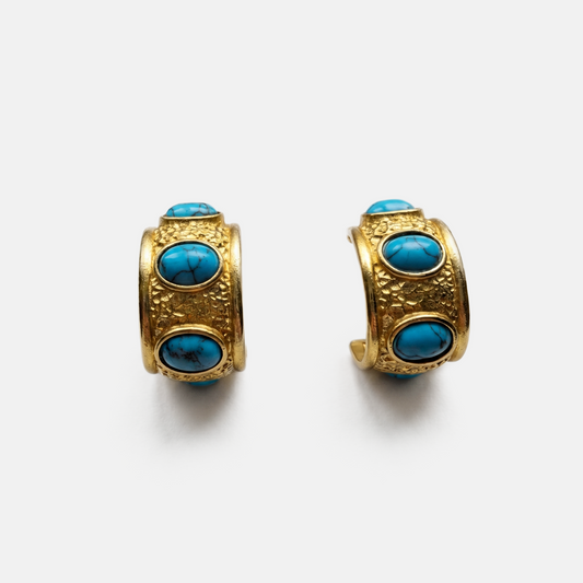 Sculptural gold huggie earrings with natural turquoise stones