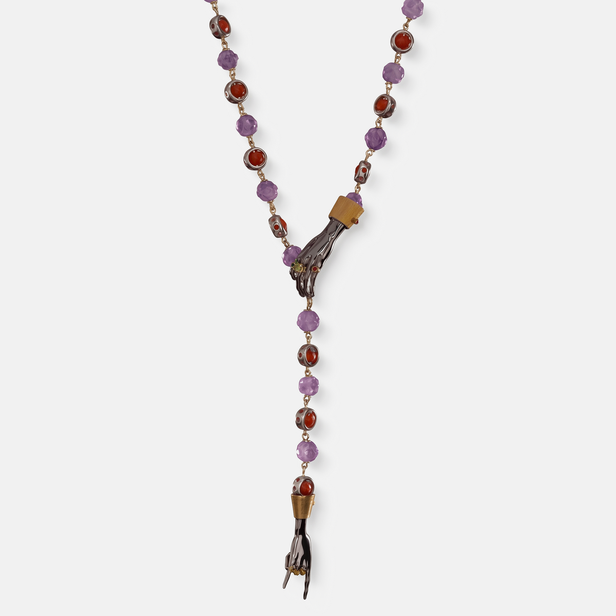 Y-shaped luxury necklace with sculptural hand pendants, amethyst and carnelian gemstones, statement designer jewellery, elegant modern fine jewellery