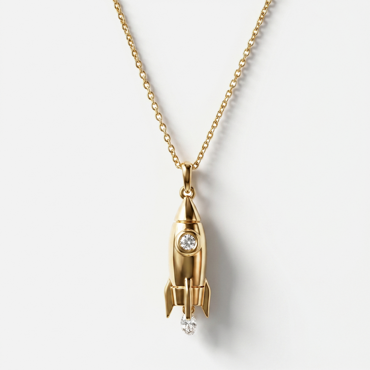 18k yellow gold rocket pendant necklace with diamond, modern luxury fine jewellery design