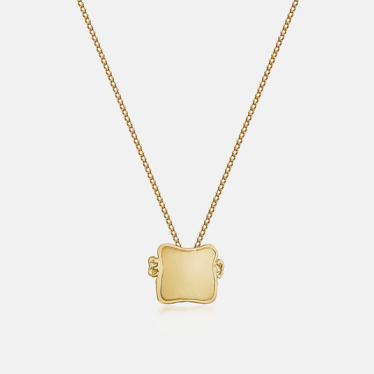 Toast Medal Pendant Necklace in recycled gold inspired by a slice of toast