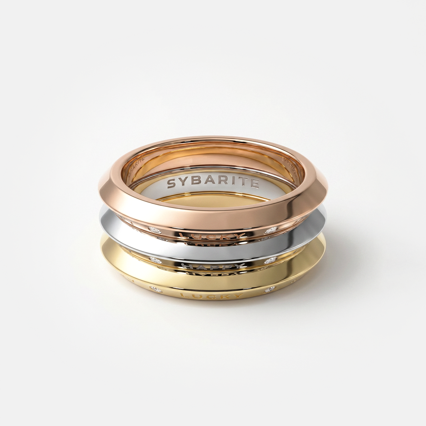 Stackable diamond rings in 18k yellow white and rose gold, luxury fine jewellery by Sybarite