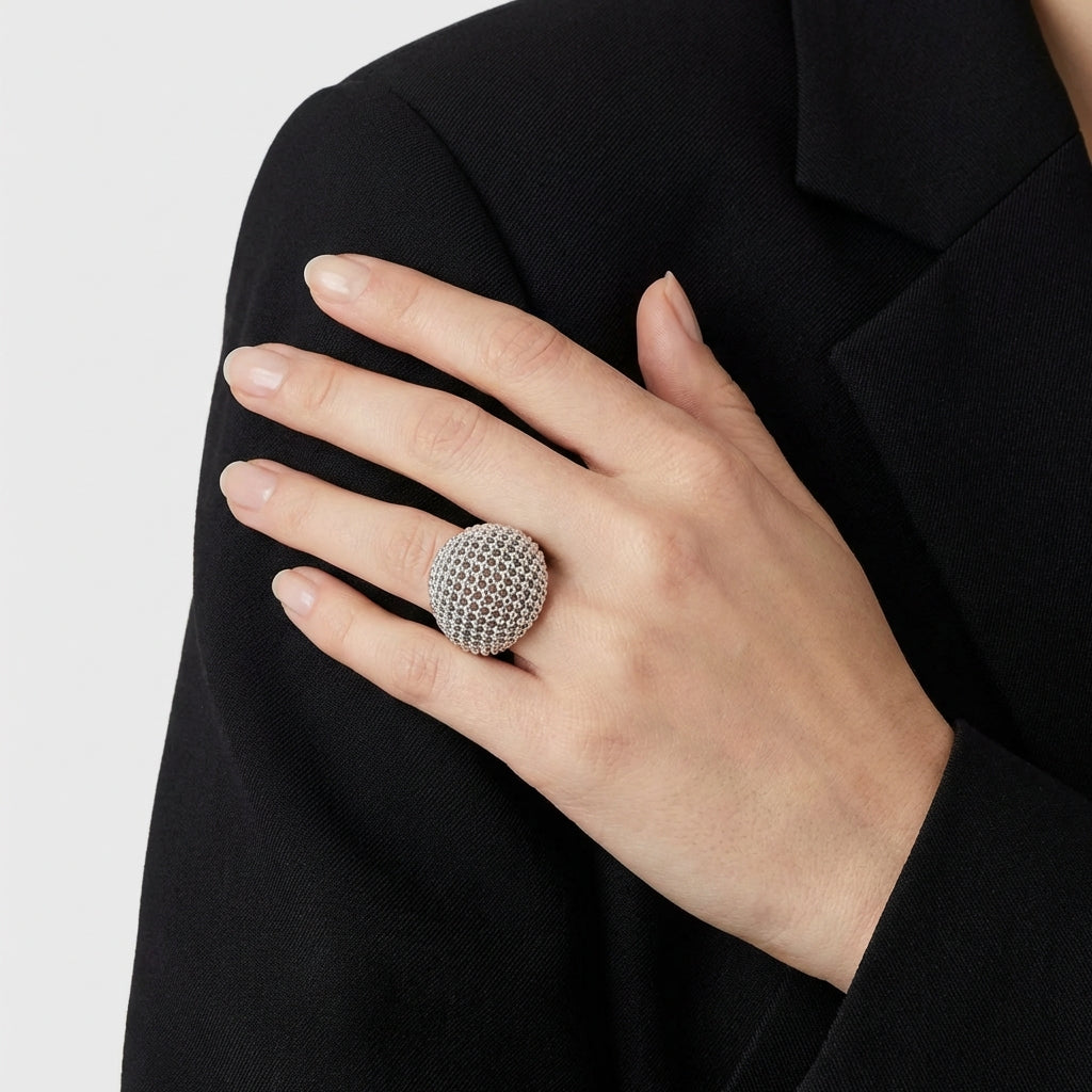 woman wearing textured sterling silver statement ring bold contemporary jewellery