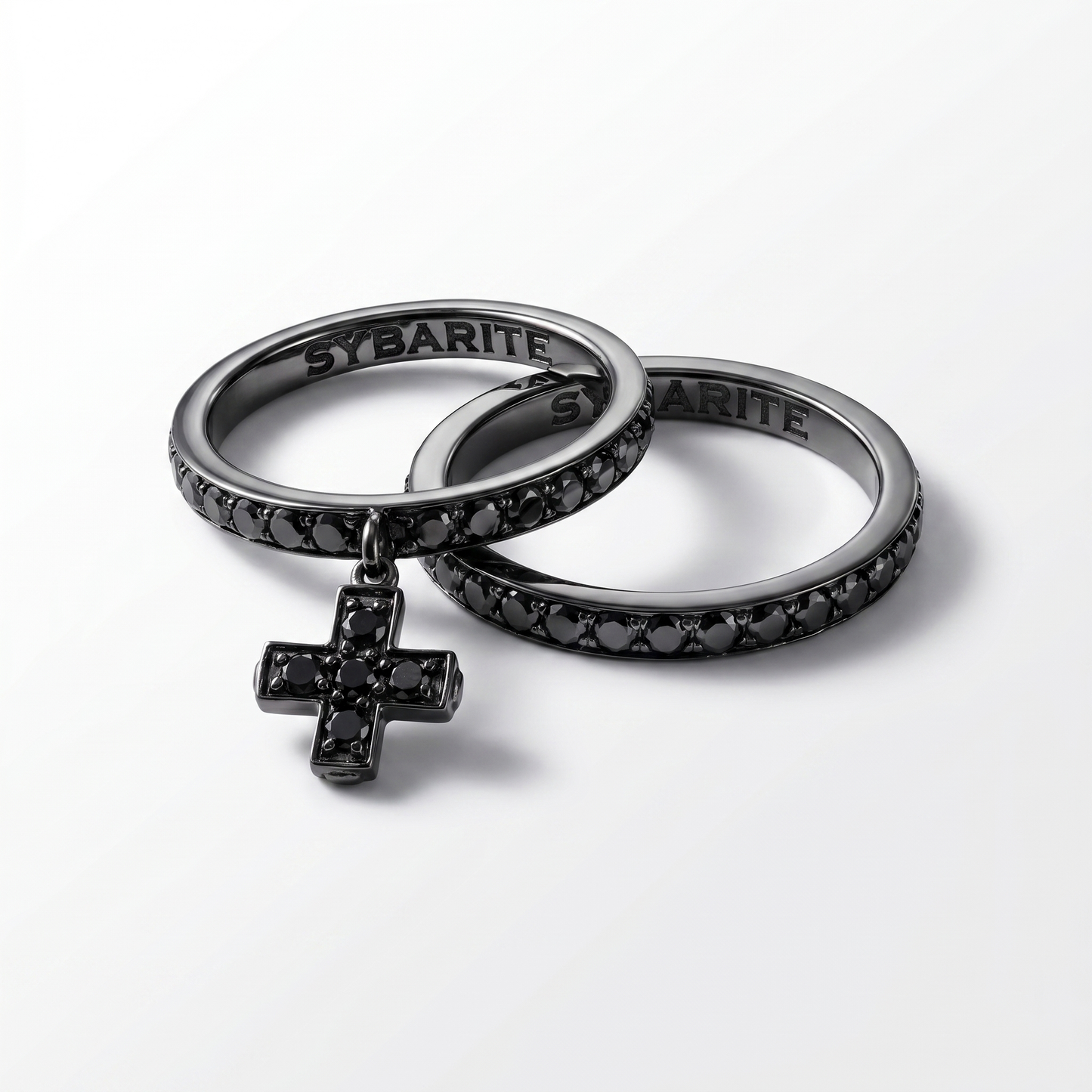 Black diamond cross charm ring in blackened 18k gold, luxury designer jewellery by Sybarite, bold gothic-inspired fine jewellery piece