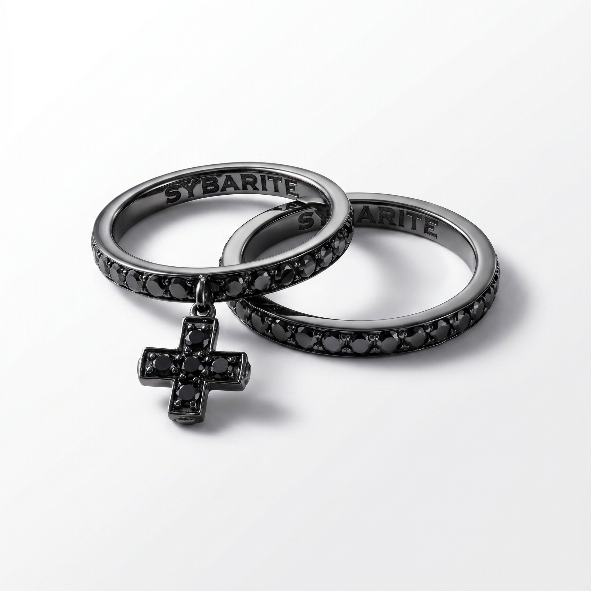 Black diamond cross charm ring in blackened 18k gold, luxury designer jewellery by Sybarite, bold gothic-inspired fine jewellery piece