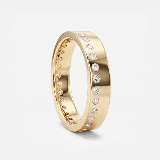 A polished yellow gold eternity-style ring with a row of round clear gemstones set around the band, shown on a clean light gray background.