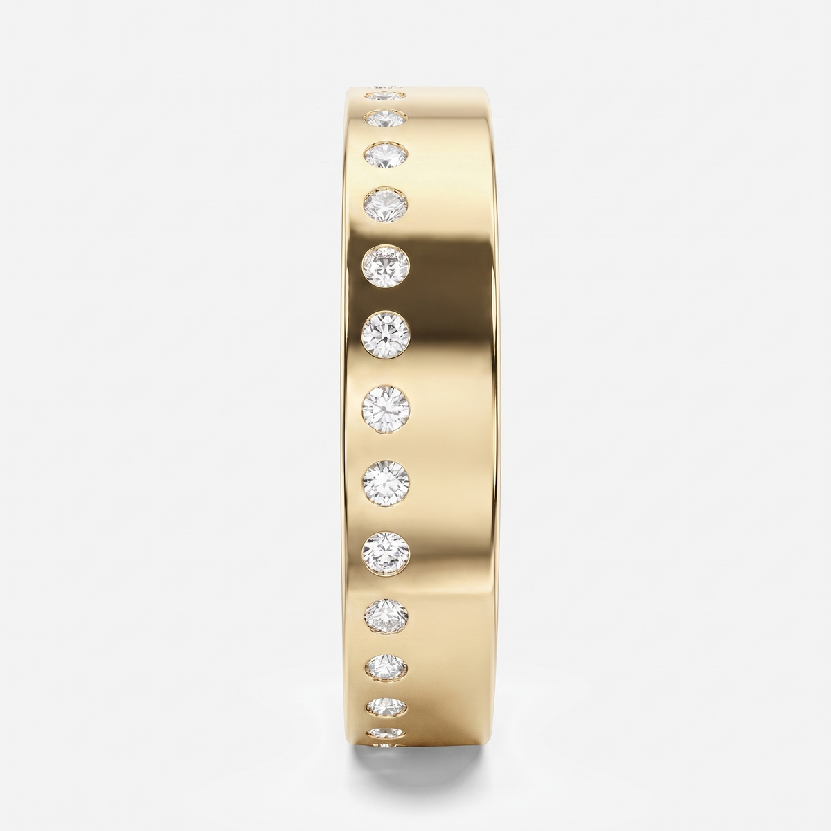 A yellow gold eternity-style band ring featuring a row of round-cut clear gemstones set along the front edge, shown against a clean light gray background.